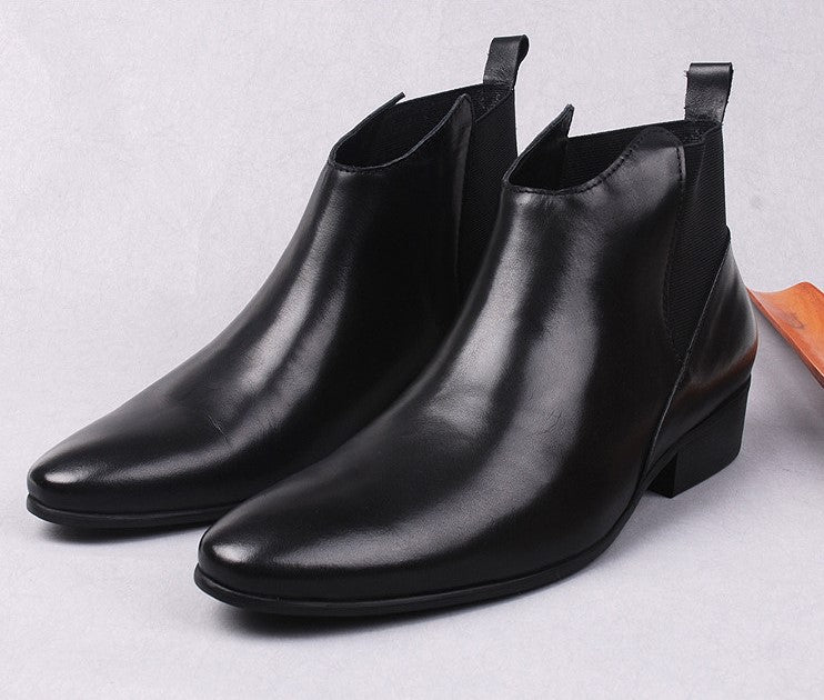 Pair of black leather Chelsea dress boots, slip-on style with elastic gore