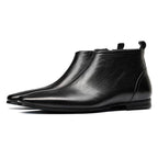 Black leather ankle boot with side zipper and thick sole, low-profile heel.