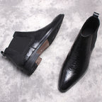 Black leather Chelsea slip-on boots with side elastic panels and block heel