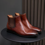Pointed-toe suede Chelsea dress boots in brown, elastic side gore