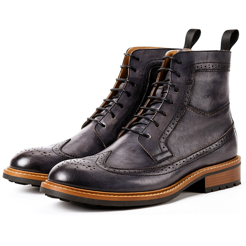 Men's dark leather chukka boots with lace-up closure and perforated toe