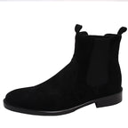Black suede Chelsea boots, side view with elastic gore and low block heel
