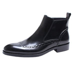 Black leather side-zip formal ankle boots with thick sole and stitched edging