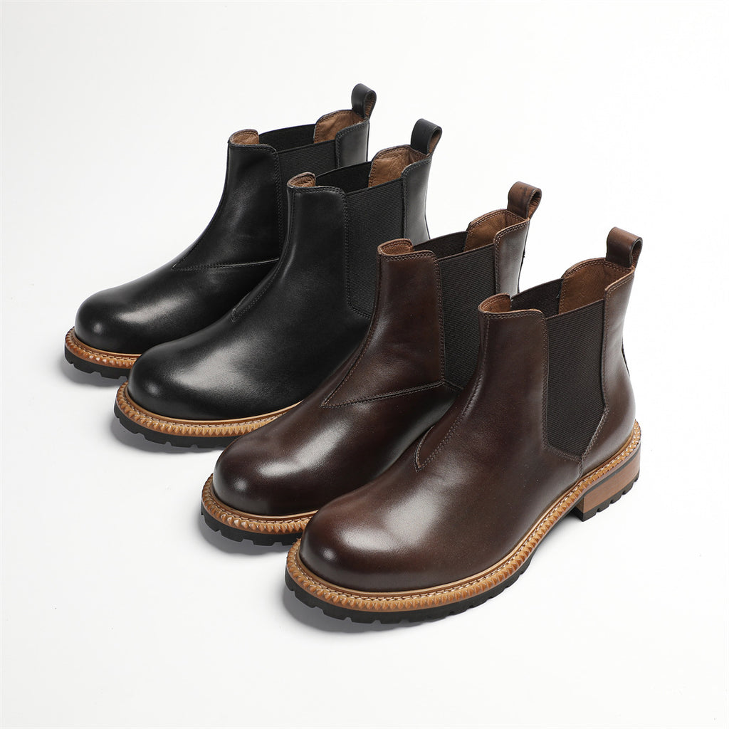 Pointed-toe Chelsea dress boots in black and dark brown, elastic side panels, pull tabs