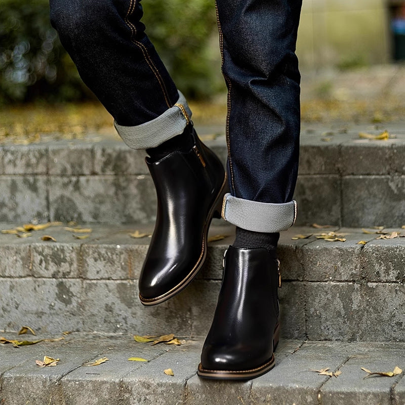 Black leather pointed-toe ankle boots with side zipper and low stacked sole