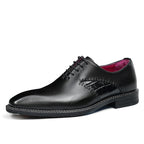 Black wingtip brogue oxford shoe with croc-textured detail and lace-up closure