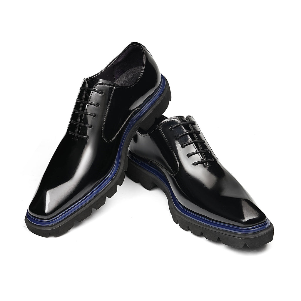 Men's black wingtip brogue oxford shoes with blue-trim lug sole, lace-up