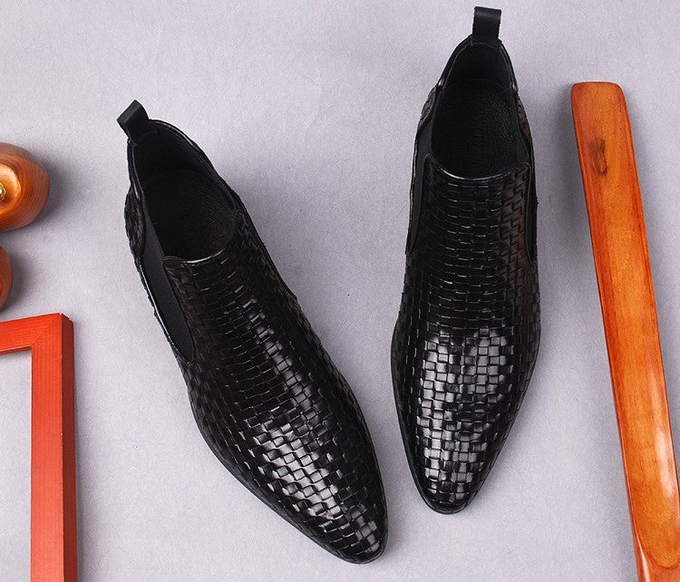 Black leather dress boots with woven pattern and pull-tab collar, side angle pair