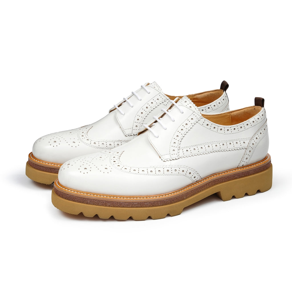 Men's leather derby dress shoes, white with perforated toe and chunky tan tread sole