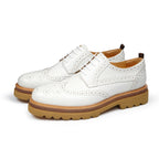 Men's leather derby dress shoes, white with perforated toe and chunky tan tread sole