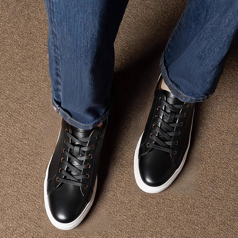 Men's black leather lace-up sneakers with white sidewall sole