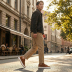 Men's dark leather sneakers in brown on a white rubber sole, lace-up design