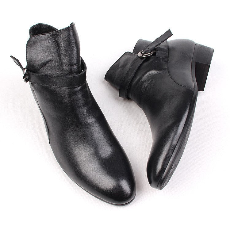 Black leather ankle boots with pointed toe and side buckle strap, low block heel.