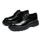 Men's leather pointed-toe derby shoes, lace-up with glossy finish and chunky platform sole.