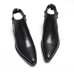 Men's black leather side-zip ankle boots with thick sole, angled view