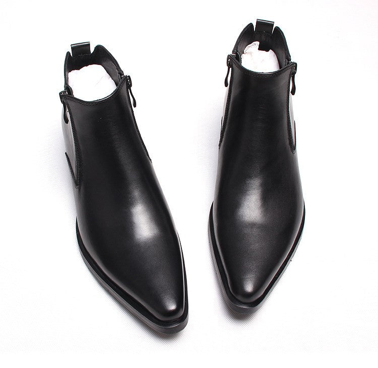 Men's black leather side-zip ankle boots with thick sole, angled view