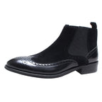 Men's black leather Chelsea dress boot, side elastic panel with brogue toe trim