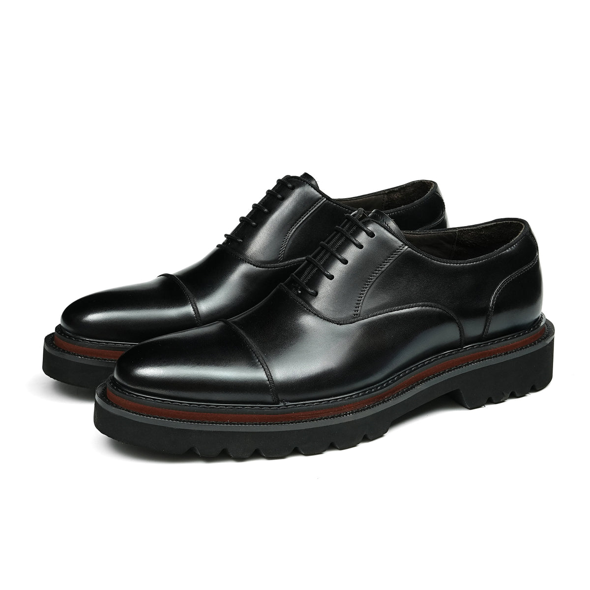 Black lace-up oxford shoes with chunky lug sole and contrast welt