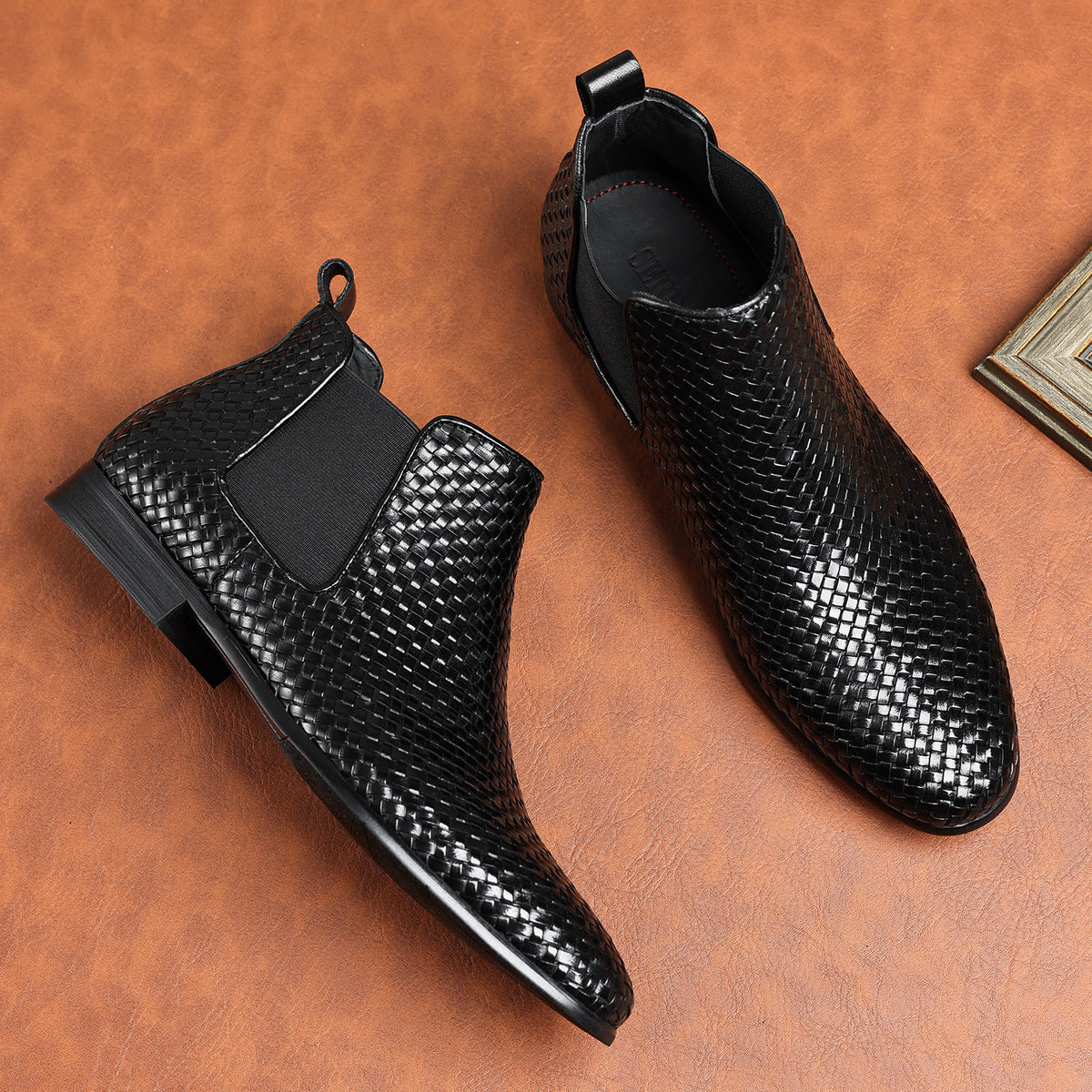 Black woven leather chelsea dress boots with side elastic and low stacked heel