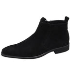 Single black side-zip ankle boot with thick sole and suede-look upper.