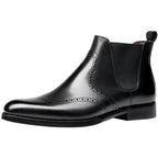Black leather chelsea dress boot with brogue toe panel and elastic side gore