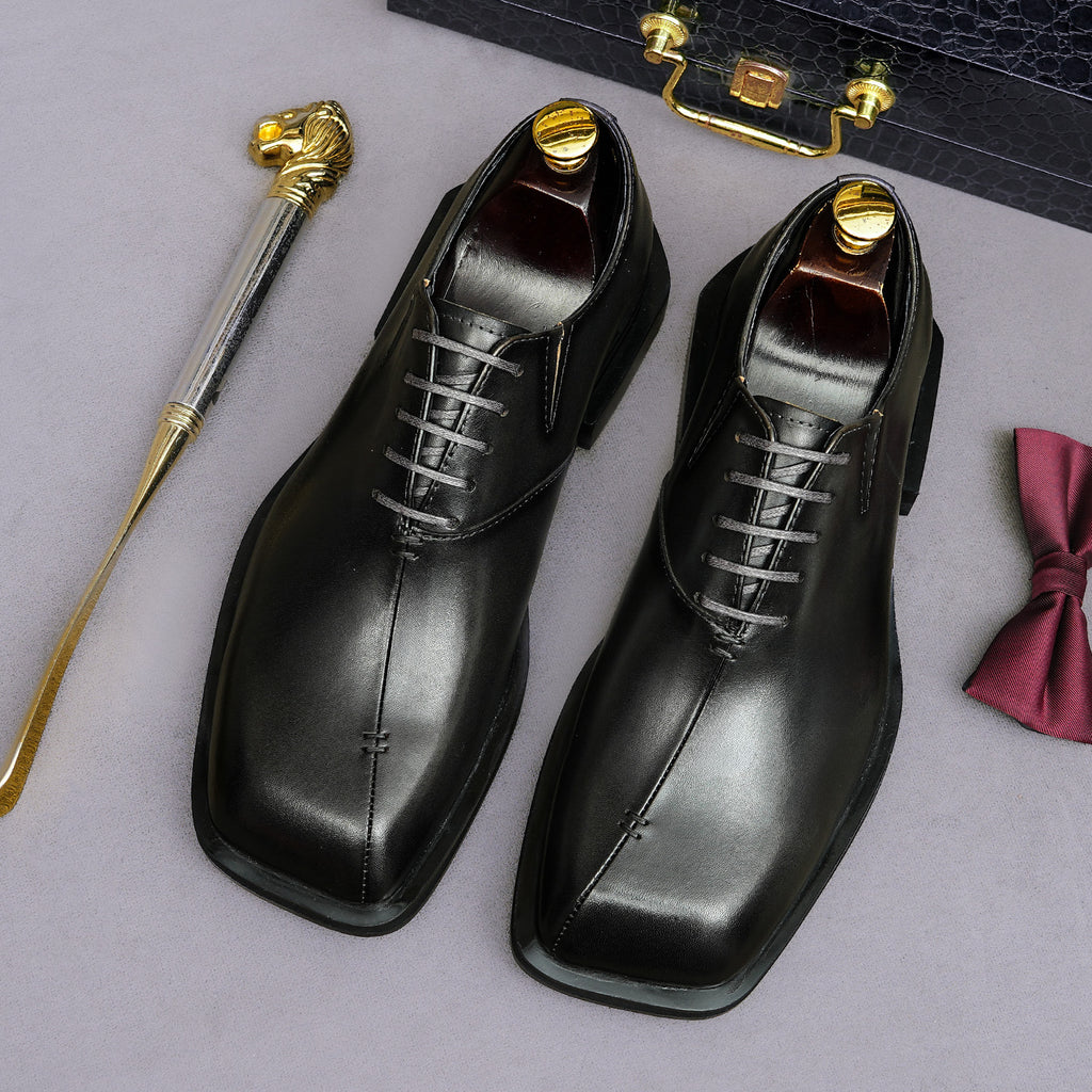 Men's chunky lug-sole wingtip brogue oxfords, black leather look, lace-up.