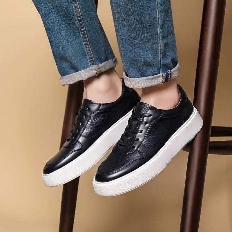 Men's black leather lace-up sneakers with white rubber platform sole
