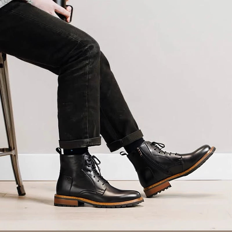 Black leather lace-up side-zip dress boots worn with dark jeans