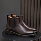 Dark brown suede chelsea dress boots with elastic side panels and stitched toe