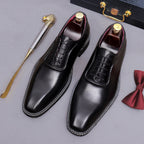 Men's chunky lug sole wingtip brogue oxford shoes in black, lace-up profile view.