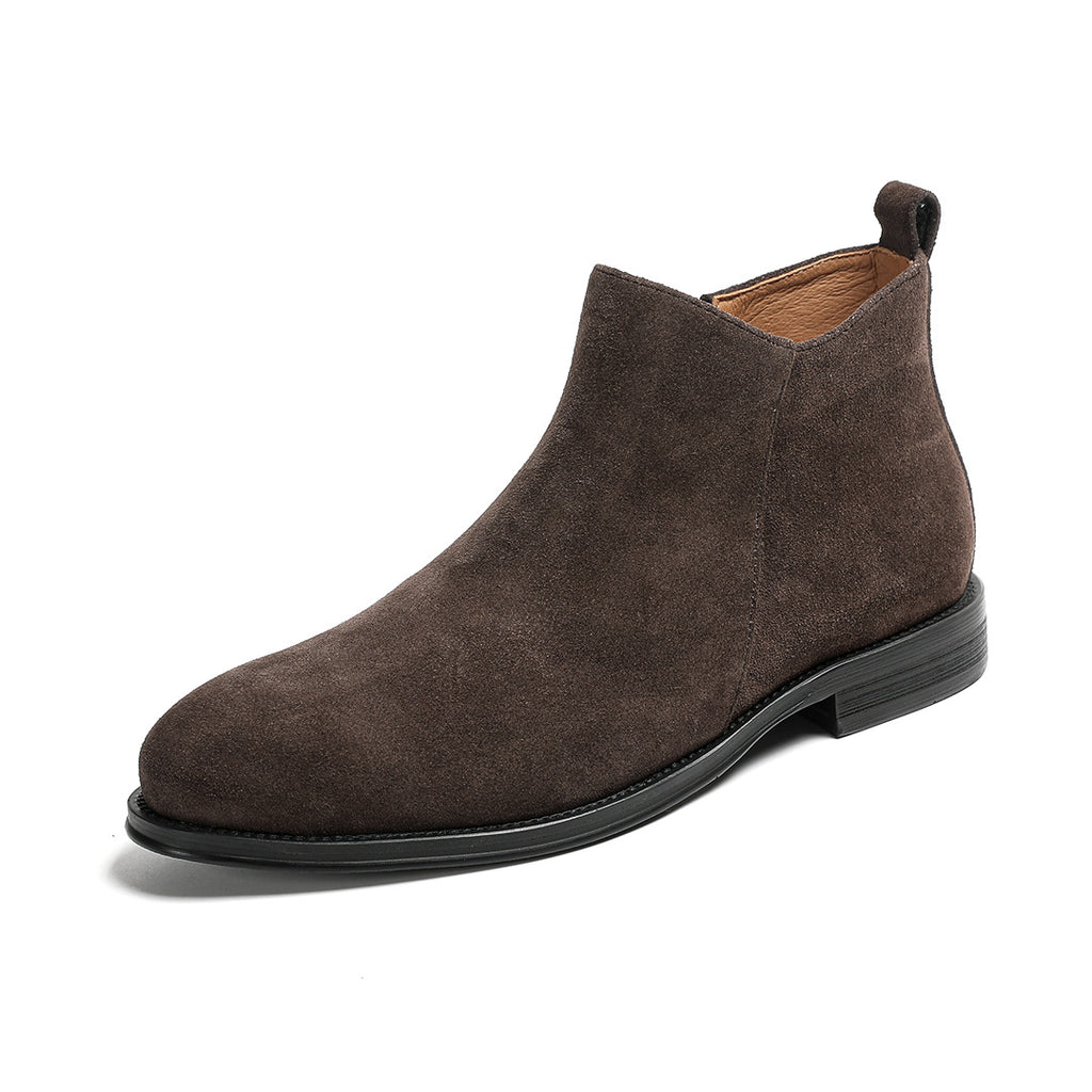 Dark brown suede ankle boots with pointed toe, side zipper, and low black sole.