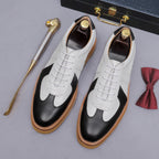 Men's white and black leather suede lace-up sneakers with tan gum lug sole
