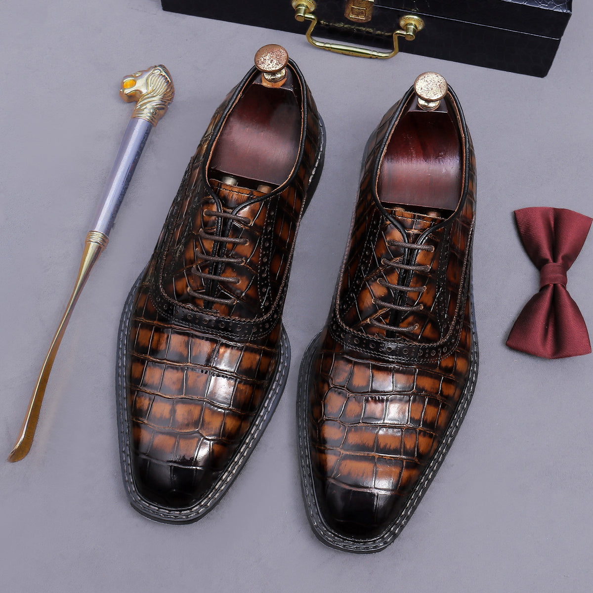 Men's dark brown wingtip brogue oxford shoes with chunky lug sole and lace-up closure