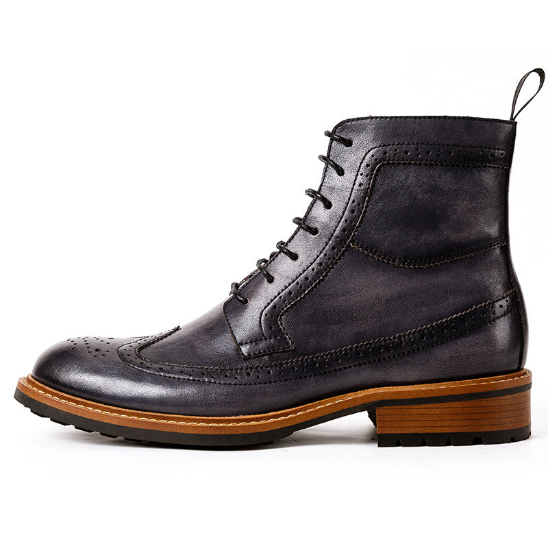 Men's dark leather lace-up chukka boot with ankle panel stitching and tread sole