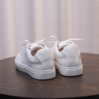 Men's genuine leather sneakers, white heel view with lace-up and low rubber outsole