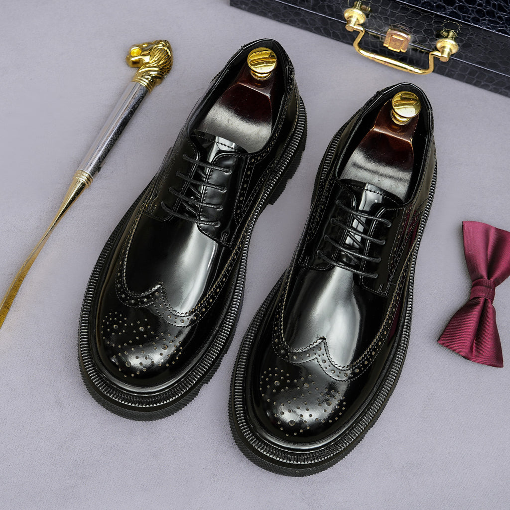 Men's leather pointed-toe derby shoes, lace-up with brogue holes and dark patina polish.