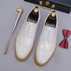 Men's leather derby dress shoes, white with perforated toe and tan sole