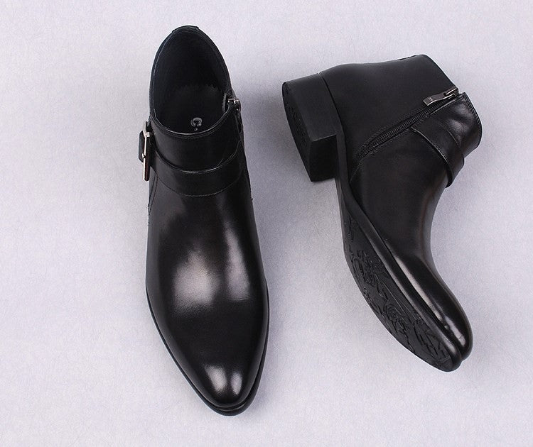 Men's black leather dress boots with thick sole and side zipper detail.