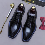 Men's black wingtip brogue oxford shoes, chunky lug sole, lace-up design