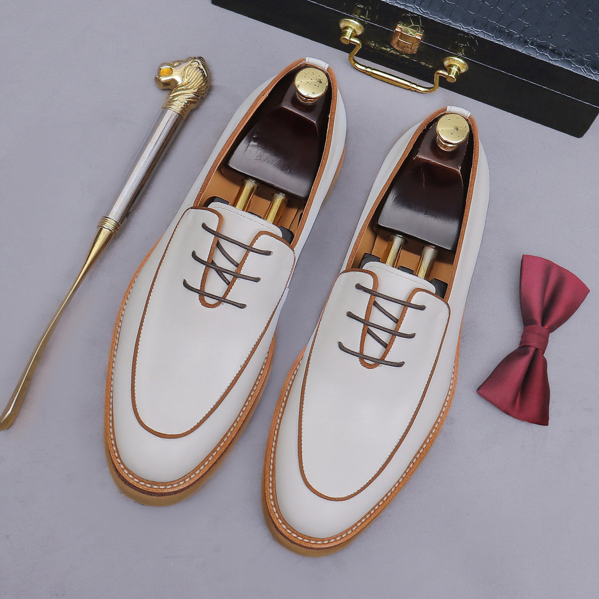 Men's chunky lug-sole wingtip brogue oxfords, white leather with brown laces