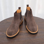 Men's suede chelsea dress boots in dark brown with elastic side panels and tan welt