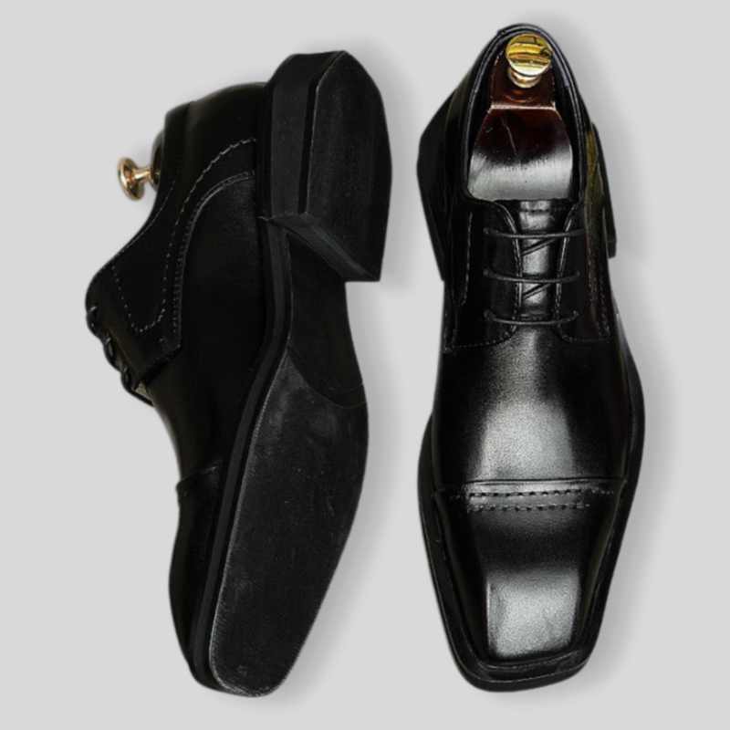 Men's black leather lace-up derby dress shoes, pointed toe and stitched upper