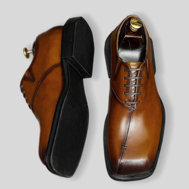Men's chunky lug sole wingtip brogue oxfords in dark brown with black sole