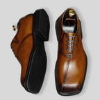 Men's chunky lug sole wingtip brogue oxfords in dark brown with black sole