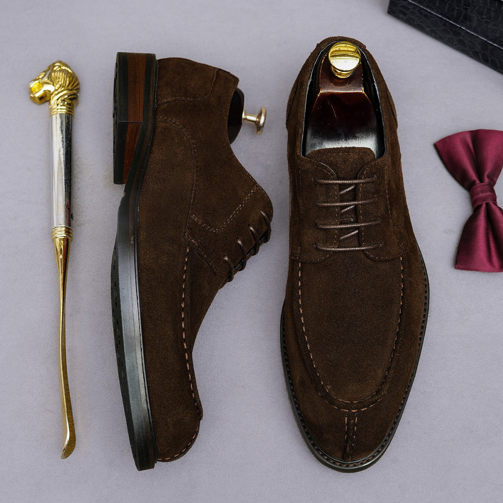 Men's brown wingtip brogue Oxford shoes with chunky lug sole and lace-up