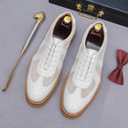 Men's white suede and leather lace-up sneakers with tan gum lug sole