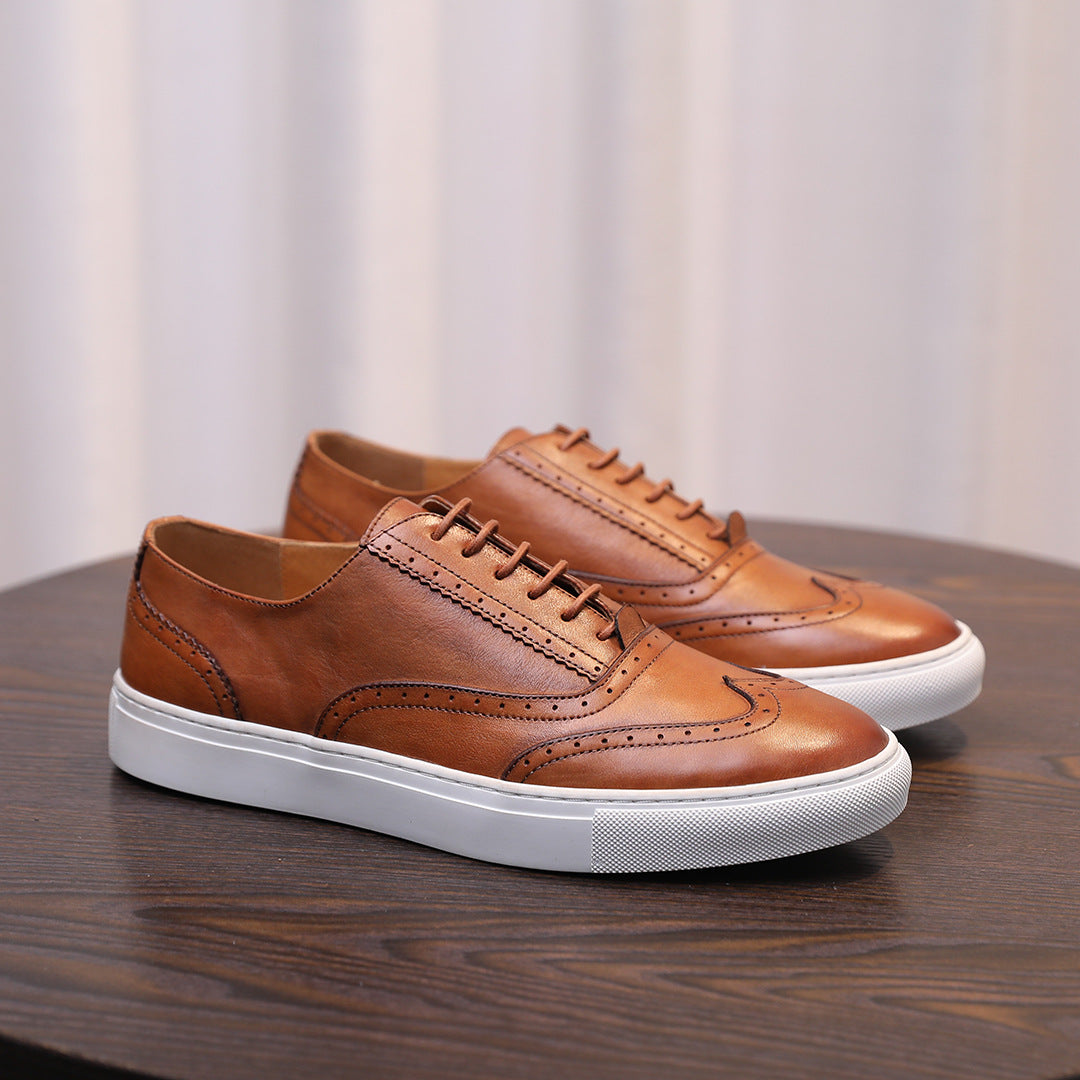Men's brown leather low-profile sneakers with lace-up closure and white rubber sole