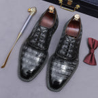 Men's black wingtip brogue oxford shoes with chunky lug sole and lace-up closure