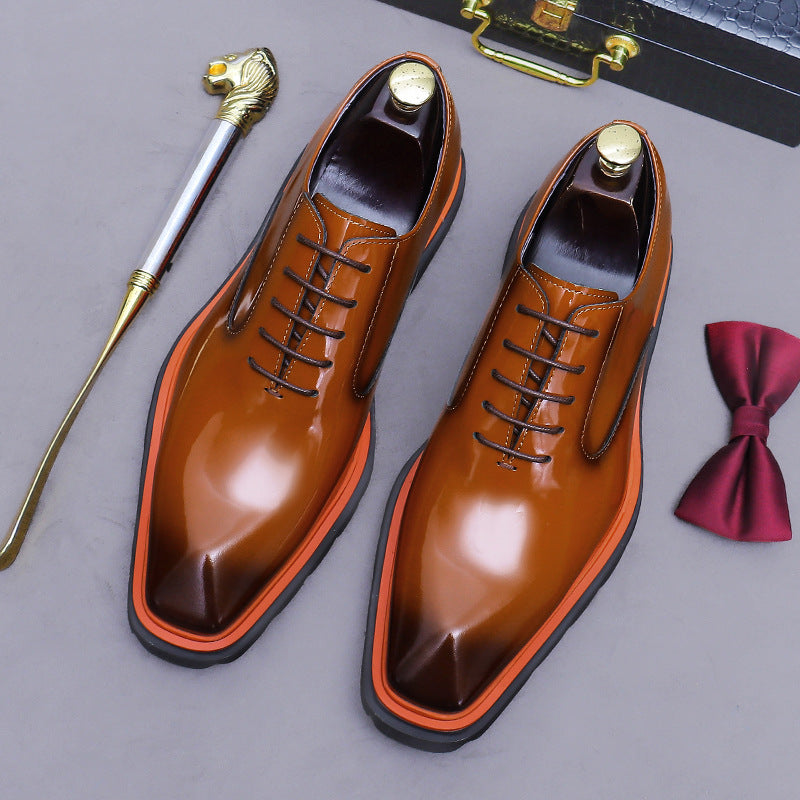 Men's brown wingtip brogue oxford shoes with chunky lug sole, lace-up upper
