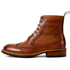 Men's brown leather lace-up chukka boot with perforated detailing and chunky sole